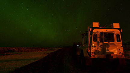 truck beneath aourora borealis